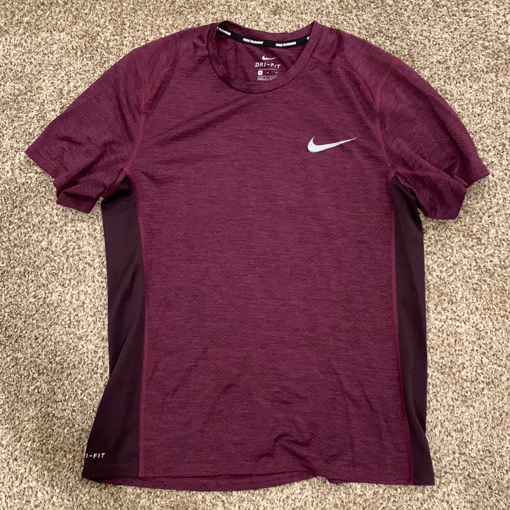 Nike Dri-Fit running shirt. Size medium. Used good condition.